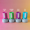 Load image into Gallery viewer, Four colorful stampers with labels on a gradient background