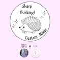 Load image into Gallery viewer, Circular design with a hedgehog illustration and text 'Sharp Thinking! Custom Name' on a pink background.