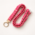 Load image into Gallery viewer, Pink scrunchie keychain and lanyard on a white background