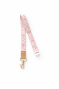 Load image into Gallery viewer, Floral patterned lanyard with a gold clip on a white background