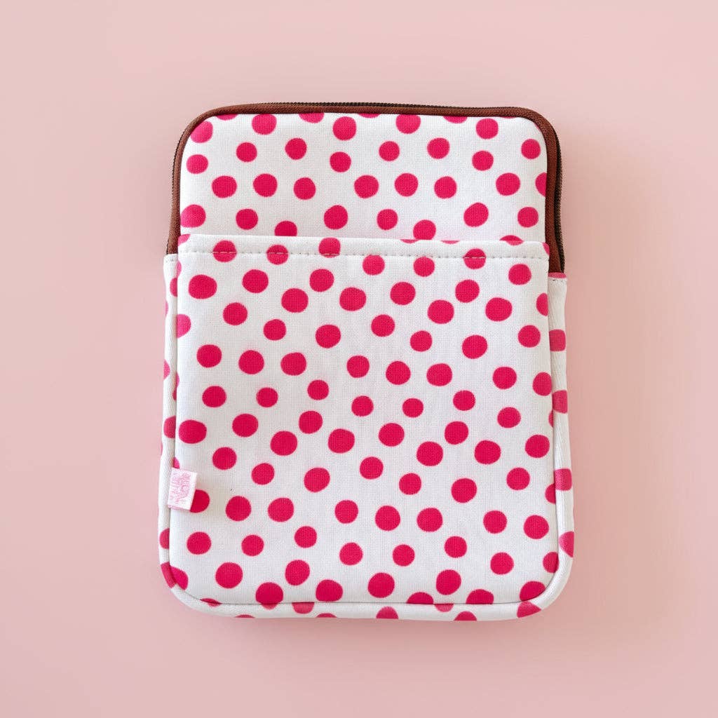 Polka dot pouch with pink dots on a white background