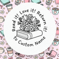 Load image into Gallery viewer, Circular design with a book and flowers, surrounded by coffee cups and decorative elements on a pink background.
