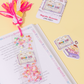 Decorative bookmarks with tassels and colorful designs on a yellow background