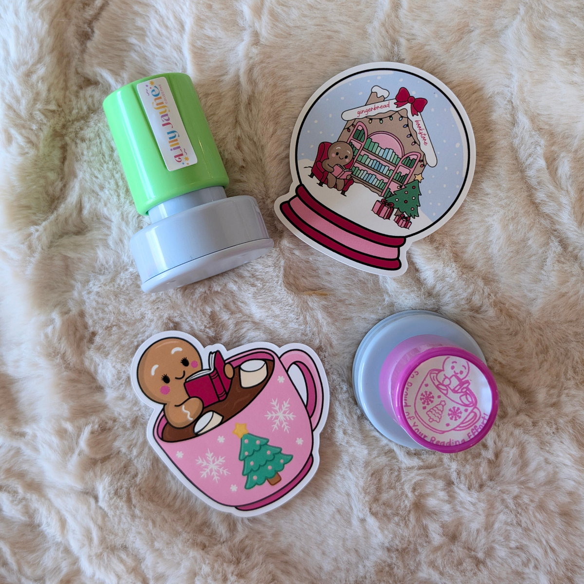 Set of Christmas-themed stickers on a fluffy white surface