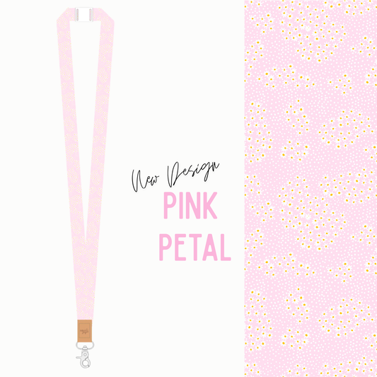 Pink lanyard with 'New Design Pink Petal' text and gold accent on a white background