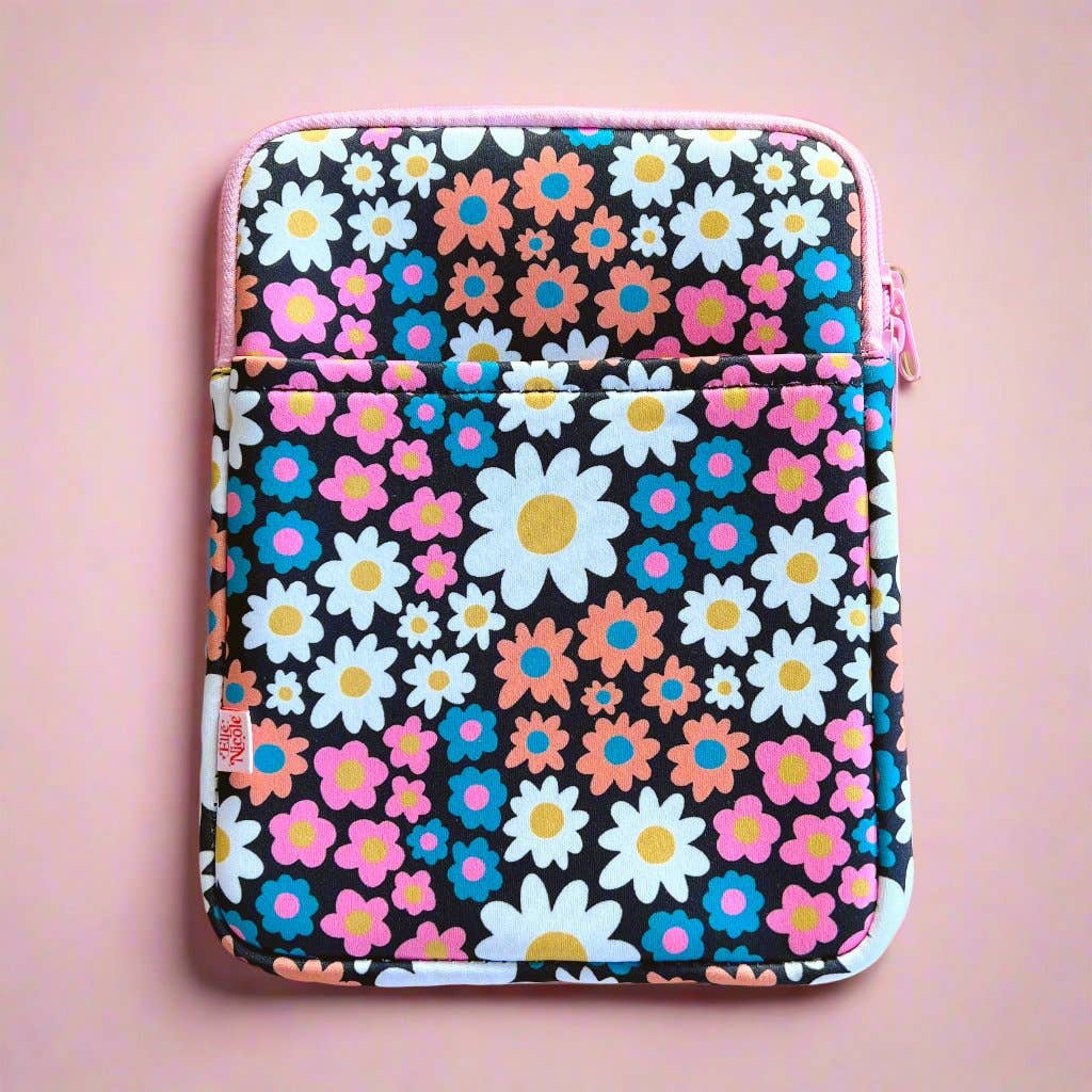 Floral patterned pouch on a pink background