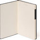 Open notebook with black binding on a white background