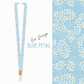 Lanyard with blue petal design on a white background