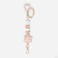 Lanyard with white flower silicone focal beads and a beige coloured flower personalised name disc. With wooden Bead and white and beige silicone beads.