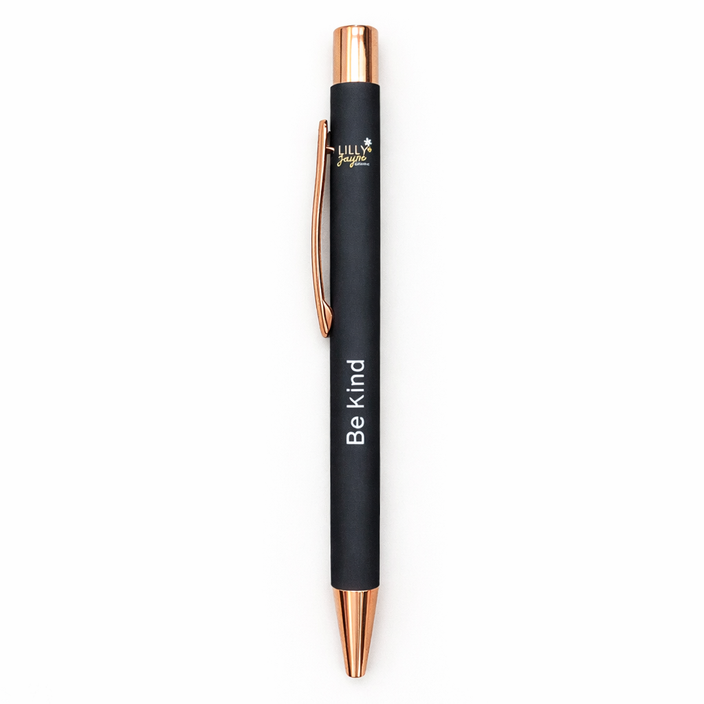 Black pen with rose gold accents and 'Be Kind' text on a white background