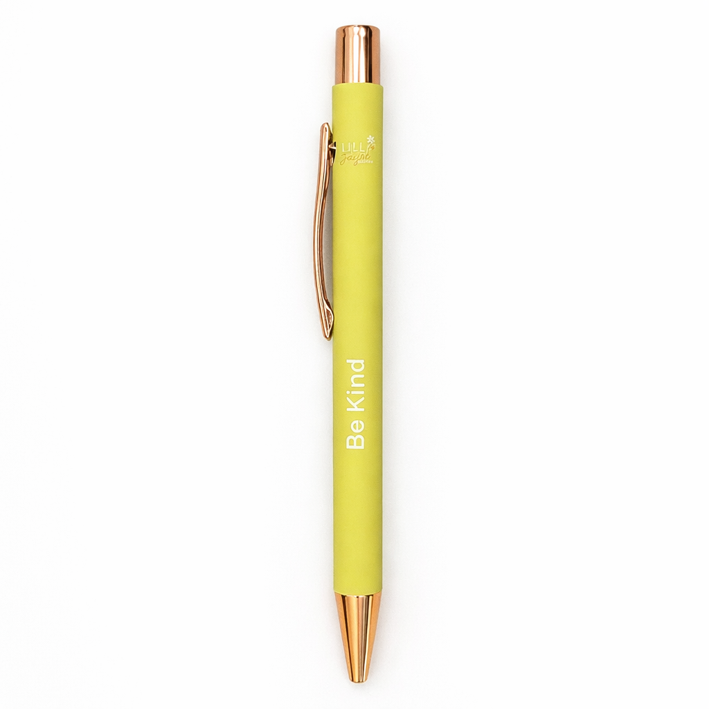 Yellow pen with rose gold accents and 'Be Kind' text on a white background