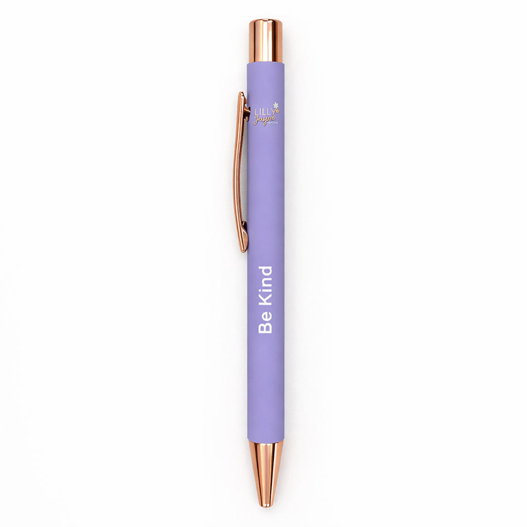 Purple pen with rose gold accents and 'Be Kind' text on a white background