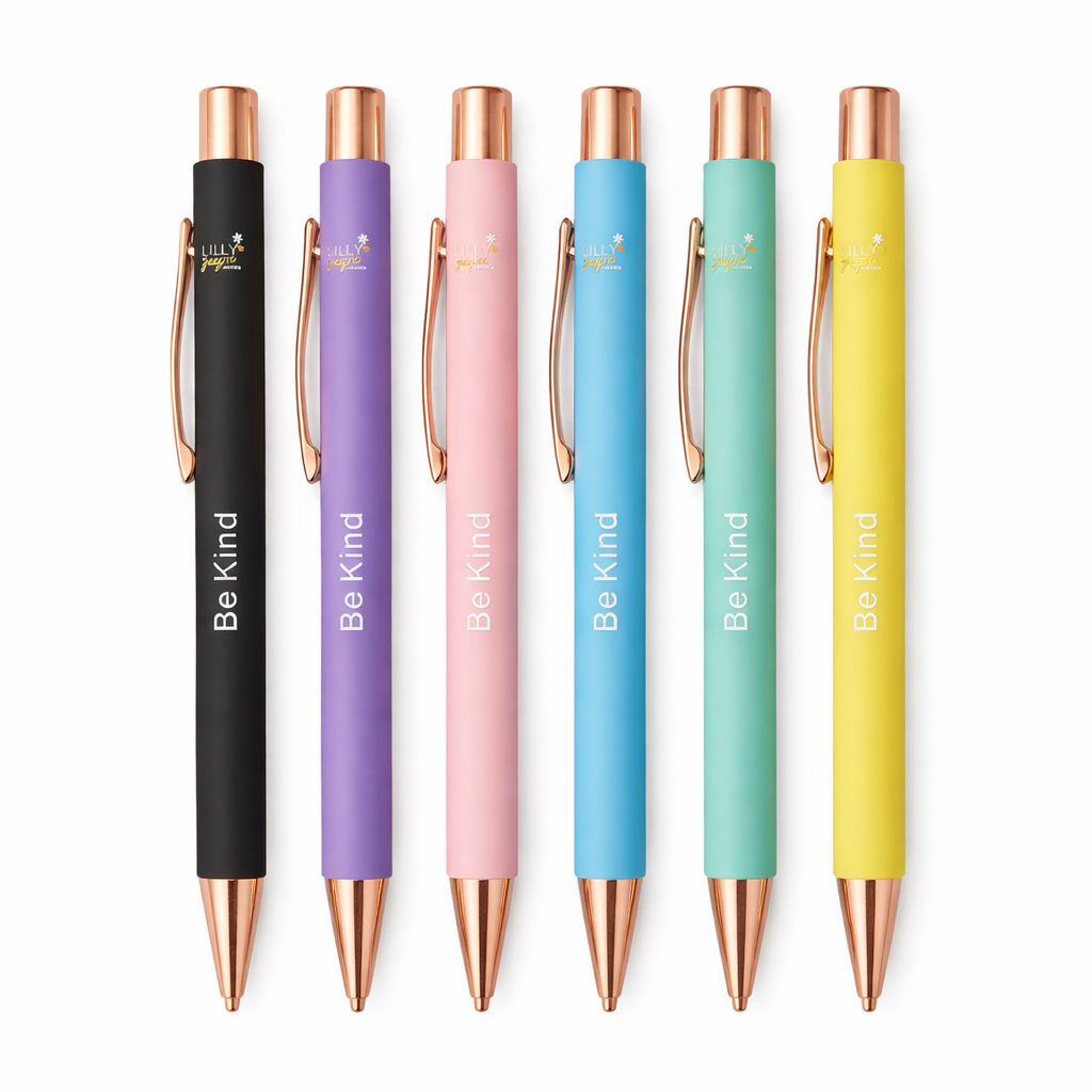 Set of six colorful pens with 'Be Kind' inscription on a white background