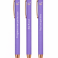 Three purple pens with rose gold accents and motivational text on a white background