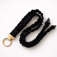 Load image into Gallery viewer, Black scrunchie keychain with gold clasp on a white background
