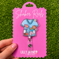 Load image into Gallery viewer, NICU / Neonatal Nurse Shaker Reel Badge
