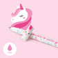 Unicorn-themed pen and eraser set on a pink background with 'Believe in Magic' text.