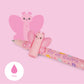 Pink lip balm with butterfly design and 'You are Beautiful' text on a pink background