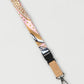 Decorative lanyard with a pattern on a light gray background
