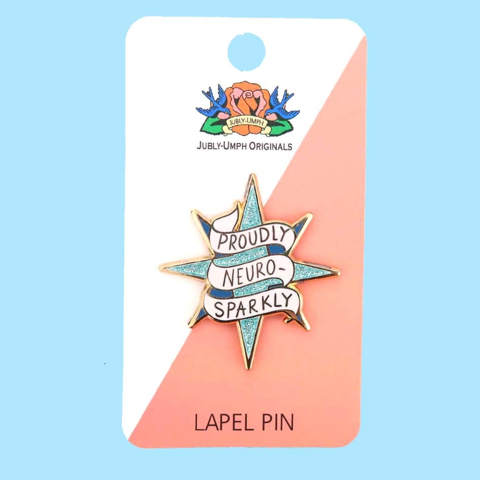 Star-shaped lapel pin with 'Proudly Neuro Sparkly' text on a card with Jubly-Umph Originals branding.