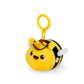 Plush bee keychain with a yellow background