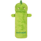 Green plush toy resembling a cucumber with a smiling face on a white background