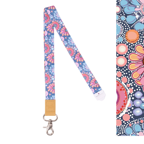 Colorful floral patterned lanyard with a key ring on a white background