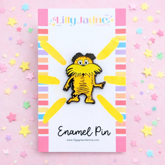 Lilly Jayne enamel pin on a colourful background with stars with lorax pin
