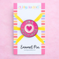 Enamel pin with heart design on a colorful card with 'Lilly Jayne Collective' branding.