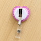 Girlie Gang Pink Heart Shaker Reel Badge