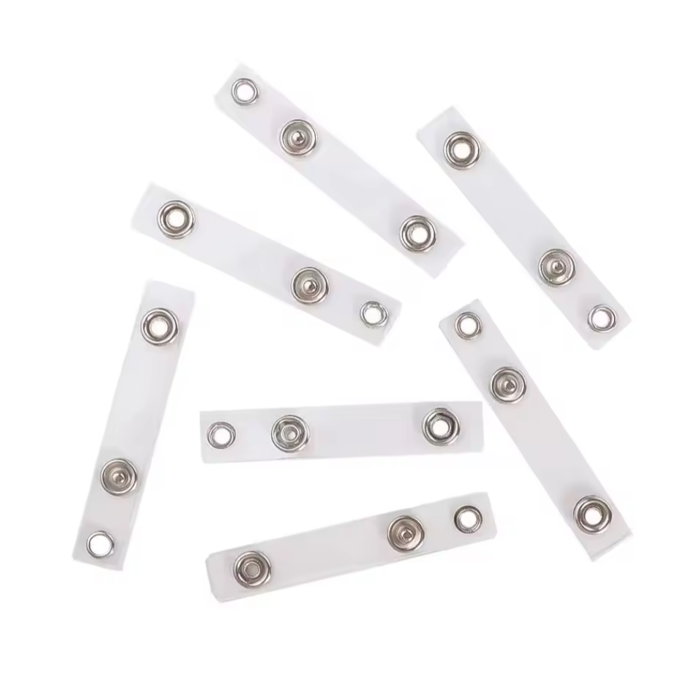 White plastic strips with metal connectors on a white background
