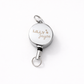 Silver retractable badge holder with 'LILLY JAYNE' engraving on a white background