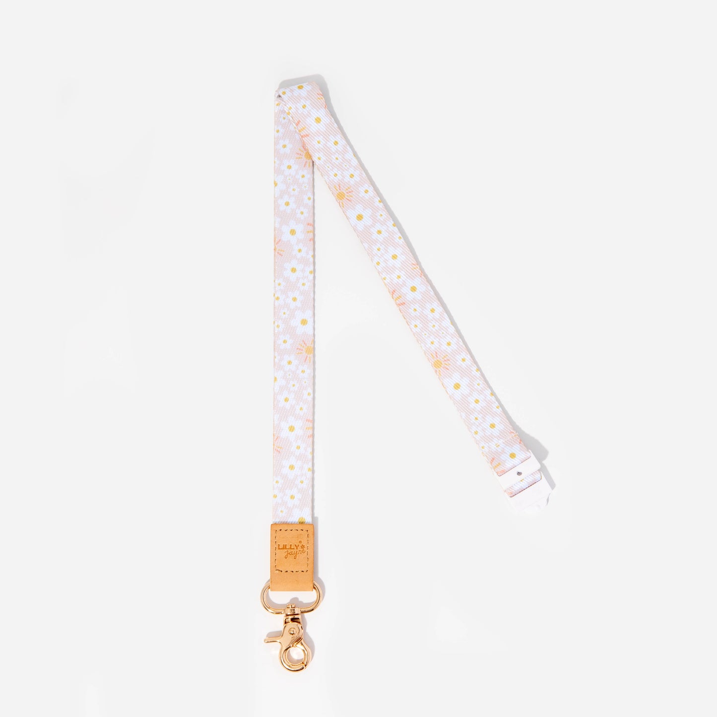 A fabric lanyard featuring a pattern with daisy flowers and a faux leather trim, secured with a strong silver clasp.